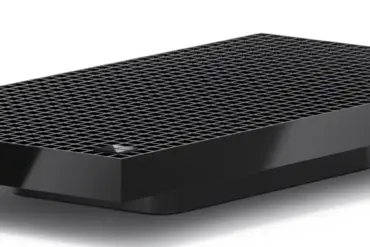 Surface RTX Spark Dev Box, en kompakt AI-PC fra Microsoft med lavprofil aluminiumskabinett og perforert toppdesign for kjøling og AI-utvikling.