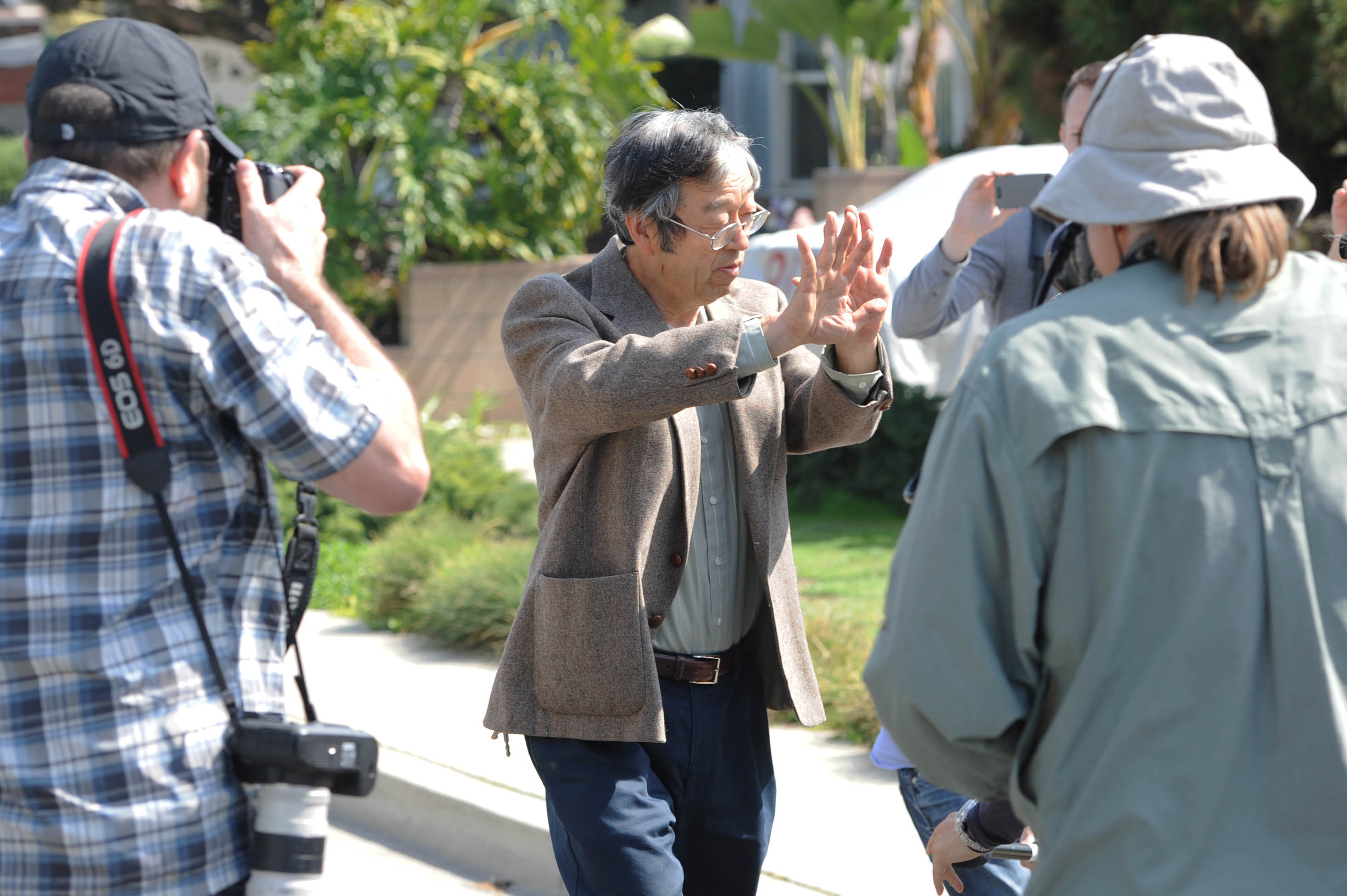 Reported 'Bitcoin' creator Satoshi Nakamoto pictured outside his home and facing the media in Temple City, California